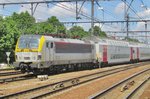 NMBS 1878 pushes an IC out of Antwerpen-Berchem on 29 June 2016.