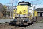 SNCB 7819 passes through Antwerpen-Noorderdoken on 19 November 2016.