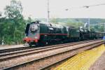 Scanned picture of Belgian Pacific 1.002 (the dot in the number is correct for Austrian and Belgian stem locos), entering Trois-Ponts on 13 July 1999.
