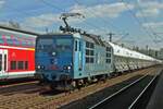 On 11 April 2014 CD Cargo 372 010 -in light blue-  hauls an automotive train through Pirna toward Dresden-Friedrichstadt.
