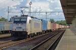 On 8 May 2015 Metrans 386 015 hauls a container train through Bratislava-Petrzalka.