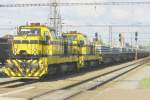 Viamont 742 703 passes through Pardubice with an engineering train on 30 May 2012. It took a bit of work to improve this picture, that was taken almost straight against the sunlight. 