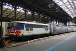 On 19 September 2011 SNCF 17026 stands with an suburban train in Paris Saint-Lazare.