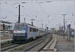 The SNCF GRAND EST BB 26152 reaches Strasbourg train station with its TER 200 from Basel.