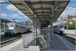 The SNCF BB 26177 and the SNCF 31549 (as well as a second Coradia Polyvalent régional tricourant are waiting to depart in Bellegarde (Ain).