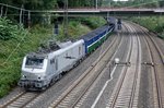 Coal train with Akiem 37030 passes the university of Duisburg on 16 September 2016.