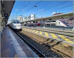 The RENFE AVE 100 221-1 multiple unit waits in Lyon Part Dieu for departure (2:32 p.m.) to Barcelona Sants (at 7:34 p.m.) and in the background a inOui TGV. 

March 13, 2024