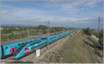 Two SNCF OUIGO TGV trains can be seen on the LGV Méditerranée high-speed line from Combe-la-Ville to Saint Louis LN5!   The picture was taken at kilometer 577.3 near Lapalud.