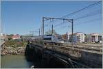 The SNCF INOUI TGV 8537 has just left the station of St Jean de Luc Ciboure and now the TGV Rame 848 is heading towards its destination Hendeay, which is not far away.