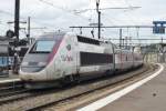 A dirty (or cleanless) TGV Lyria 4410 quits Dijon on 2 June 2014. TGV Lyria are the French-Swiss version of the TGV-POS.