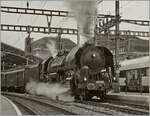 The SNCF 141 R 568 leaves Lausanne station with the popular steam train  Train Casse .