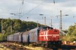 HGK DH 36 with former NS freight wagons passes Kln West on 21 May 2005.