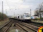 On a grey 21 March 2017 Rheincargo DE 802 hauls a block train through Rheinhausen.