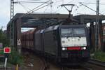 On 8 September 2015 MRCE 189 455 hauls a coal train through Celle, coming off the bridge near the station.