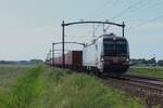 Railpool 193 145 hauls an intermodal train through Hulten on 5 June 2024.