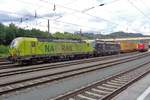 TX Log 193 559 stands in front of a container train at Kufstein on 18 May 2018. 