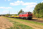 Locomotive 215 028 from NeoLox passing in Kaarst Broicherseite with a worktrain, 21/8/2025