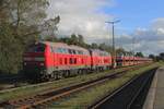 DB 218 322 hauls a Sylt Shuttle car carrying train out of Niebüll toward Westerland (Sylt) on 21 September 2025.