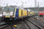 Start/Metronom 246 007 pushes a regional train out of Hamburg-Harburg to Cuxhaven on 14 February 2026.