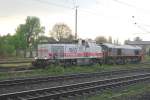 Mindener KresiBahn V-19 shunts Yeoman 59003 at Minden on 28 April 2011 during a thunder storm.