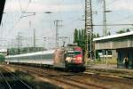 On 3 August 2002 DB 101 068 with POkal-livery of the winners (Bayer Leverkusen) entered Duisburg Hbf.