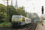 Scanned picture of 103 220 with I-11 stock passing Kln Deutz on 21 May 2001.