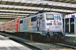 Advertiser 111 027 stands in München Hbf on 21 May 2010.