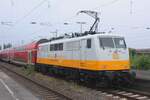 Ex-DB 111 095 carries the experimental 'Lufthansa' colours whilst standing at Oberhausen Hbf on 21 June 2024.