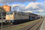 SmartRail 111 223 hauls a car carrying train through Koblenz on 3 January 2025.