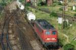 View from a bridge. DB 140 815 enters Halle (Saale) Gbf on 28 May 2005.