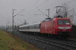 On a rainy 12 February 2026 TRI 145 097 pushes RB37 through Kaarst-Broicherseite toward Krefeld. The 1986 red with white slab on the loco is a little joke on behalf of TRI, since DBAG 145s never had this colour scheme. 