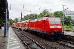 On a rainy 6 July 2013 DB 146 022 leaves Bonn Hbf.