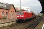 185 064 with coal train passes through the curvature of Vlklingen station on 16 September 2011.