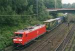 On 3 June 2003 185 068 with an intermodal train passes the Mercator-University at Duisburg.