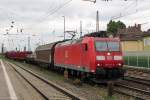 DB 185 133 passes the station of Mainz Bischofsheim (which is public land) on 30 May 2014.