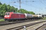 From Bahnsteig 10 at Mannheim Hbf, one has a clear-and legal!- sight of freights passing Mannheim Hbf, like 185 025 on 5 June 2014. Just keep within the comfines, as I here do.