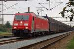 DB 185 324 waits for departure at Padborg on 24 September 2014. The photo was shot from a little lane at the station's southern throat.