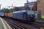 A bit against the Sun: MRCE 185 545 passes through Hamburg-Harburg on 25 September 2014.