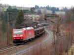 185 168-2 with a heavy train loaded with sleepers at Ulm March 31st, 2009.