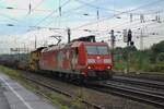 Switzerland advertiser 185 142 hauls an engineering train through Duisburg-Entenfang onn 27 April 2016.
