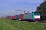 On 23 August 2019 RTB 186 207 hauls a fully loaded container train through Hulten (between Gilze-Rijen and Tilburg-Reeshof stations).