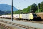 Canary yellow and silver is a scheme fast disappearing with DispoLok (now MRCE), of which 189 909 is seen in Kufstein on 2 July 2013.
