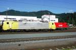 Canary yellow and silver is a scheme fast disappearing with DispoLok (now MRCE), of which 189 909 is seen in Kufstein on 2 July 2013.
