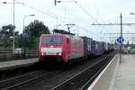 DB 189 084 slows down at Blerick on a grey 16 August 2013.