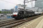 MRCE 189 114 passes through a grey Eindhoven on 31 August 2013.