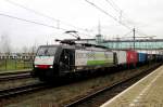 On 13 February 2014 RurTalBahn 189 103 passed through a very rainy Boxtel. The EGS on the stickers means  European Gateway Service  and is a cooperation between RTB and the Rotterdam European Container Terminal.

