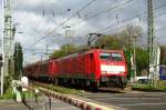 Iron ore shuttle with 189 073 from Kijfhoek to Dillingen (Saar) arrives at a both sunny and cloudy Emmerich on 14 April 2014.