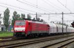 On an at times grey and rainy 31 August 2014 DBSRN 189 080 hauls a lime train through Zevenaar.