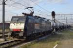 MRCE/LOCON 189 099 speeds through Boxtel on 28 November 2014.