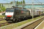 MRCE 189 096 hauls a freight through Boxtel on 22 August 2015.